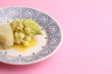 romanesco vegetable dish in color background