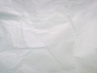 Top view, full frame shot of white crumpled paper background.