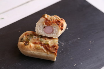 hot dog with cheese and pepper