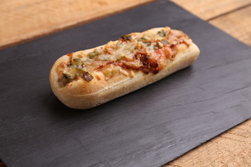 hot dog with cheese and pepper