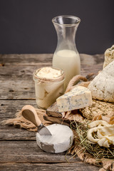 large assortment of international cheese specialities on black background. Healthy Eating