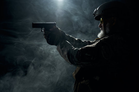 Old Military Officer Pointing With Gun.