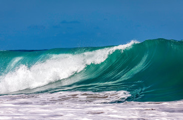 Ocean Wave Closeup Water. Ocean wave closeup detail of upright crashing hollow breaking water. energy power of nature.