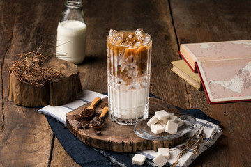 Ice chocolate milking with dark chocolate decorate with sugar around.