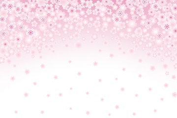 桜の花びらが散る背景