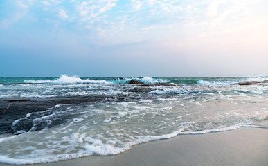 Beautiful sea beach rock shore landscape before sunset in summer season