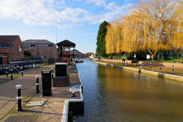 Newark Town locks on the River Trent in bright winter sunlight.