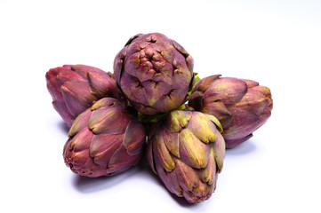 Fototapeta premium Heads of raw fresh purple artichoke plant ready to cook
