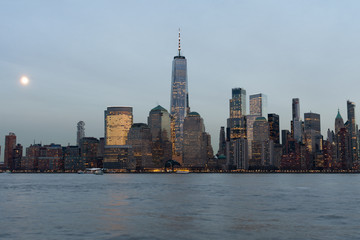 Obraz premium Early Evening Lower Manhattan New York City Skyline at Night with the Moon