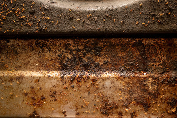 Rust marks on all parts of the gas stove.