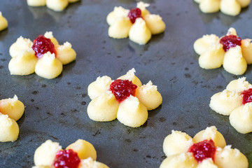 Homemade food. Making warm, golden handcrafted cookies on baking sheet Natural organic snakes for healthy breakfast