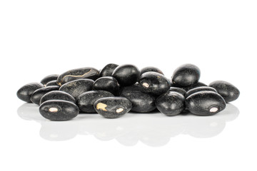 Lot of whole black bean heap isolated on white background