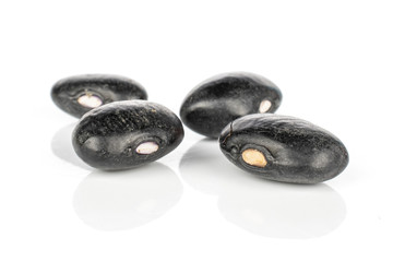 Fototapeta na wymiar Group of four whole black bean isolated on white background