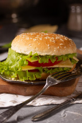 Fresh sandwich with cheese, lettuce and tomato