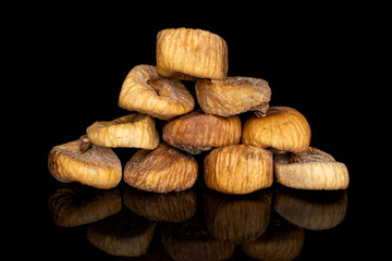 Lot of whole dried fig isolated on black glass