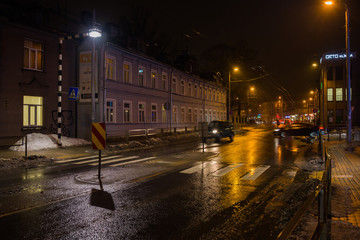 Fototapeta na wymiar RIGA, LATVIA - APRIL 25, 2019: View to Nometnu street (Nometnu iela) in Agenskalns district at night