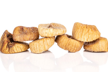 Group of seven whole dried fig isolated on white background