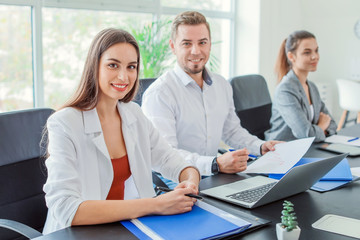 Group of business people during meeting in office