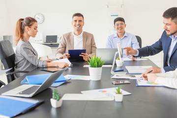 Group of business people during meeting in office