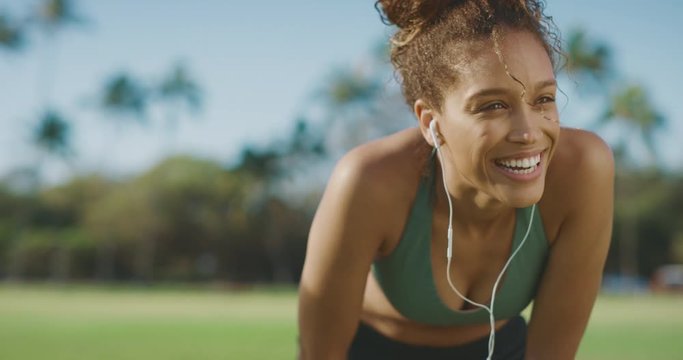 Portrait of a beautiful smiling african american woman during her morning workout, happy athletic woman living a healthy lifestyle