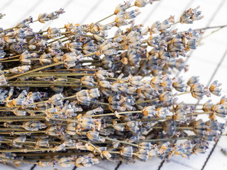 Bouquet of dried lavender on the tablecloth