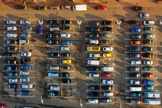 Aerial Of A Parking Lot Near Supermarket