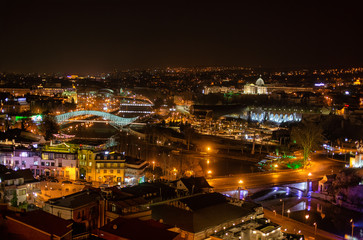 Fototapeta na wymiar Aerial view of night cityscape of Tbilisi