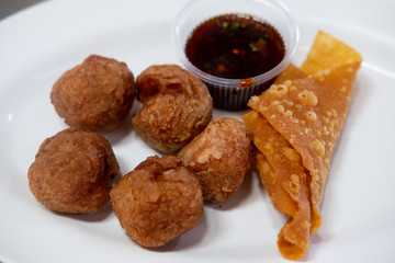 Fried meatballs and crispy fried dumplings