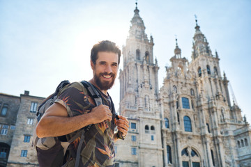 Portrait Of Happy Man On Pilgrimage At Santiago De Compostela - obrazy, fototapety, plakaty