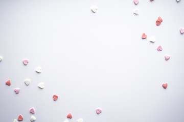 Sweet hearts on a white background, with space for text, flat lay. Valentine's Day. Love concept.