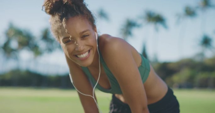 Portrait of a beautiful smiling african american woman during her morning workout, happy athletic woman living a healthy lifestyle
