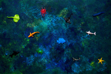 Marine life on oil painted background.