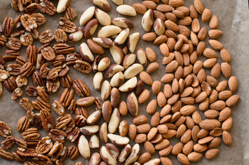Background of mixed nuts - pecans, almonds, brasil nuts