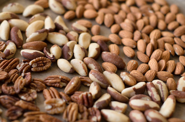 Background of mixed nuts - pecans, almonds, brasil nuts