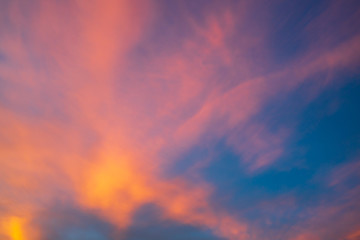 Colorful dramatic sky with orange clouds