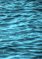 Naklejka premium Sea wave water blue South sun glare blurred