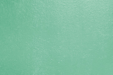 Wooden old painted background, tinted in an aquamarine hue