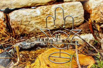 Image of Jewish holiday Hanukkah. Jewish candlestick Menorah in style popular amulet Hamsa....