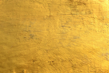 Gold color of glitter textured background 