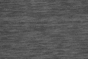 Fototapeta na wymiar Gray and black fleece textured plush fabric material background