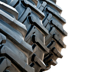 Stack of brand new tractor tires, isolated. © Andrej