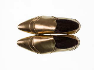 golden men shoes isolated on white background