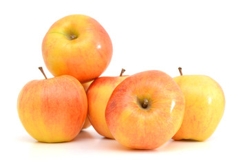 Red and yellow apples on white background