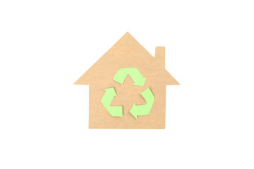Cardboard house with recycle sign isolated on white background