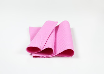 Ribbed pink placemat