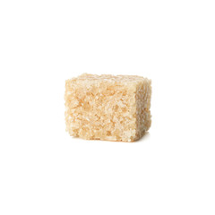Brown sugar cube isolated on white background, close up