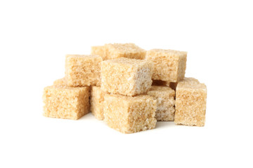 Brown sugar cubes isolated on white background, close up