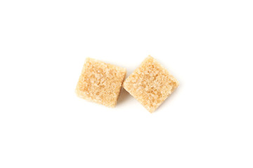 Brown sugar cubes isolated on white background, close up