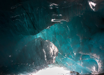 patterns on the ice ceiling inside the glacial cave of the Alibek mountain glacier