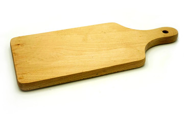 Wooden kitchen utensils on white background. Handcrafted cutting board.